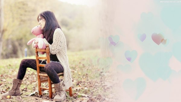 Alone-Girl-Sitting-On-Chair-With-Teddy-Bear-Wallpaper