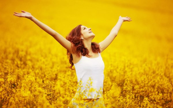 Happy Girl In Yellow Fields Wallpaper